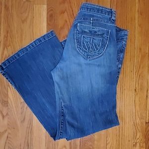 DKNY Trouser Jeans Size 12. Medium wash denim.Boot cut Great condition,cool Boho